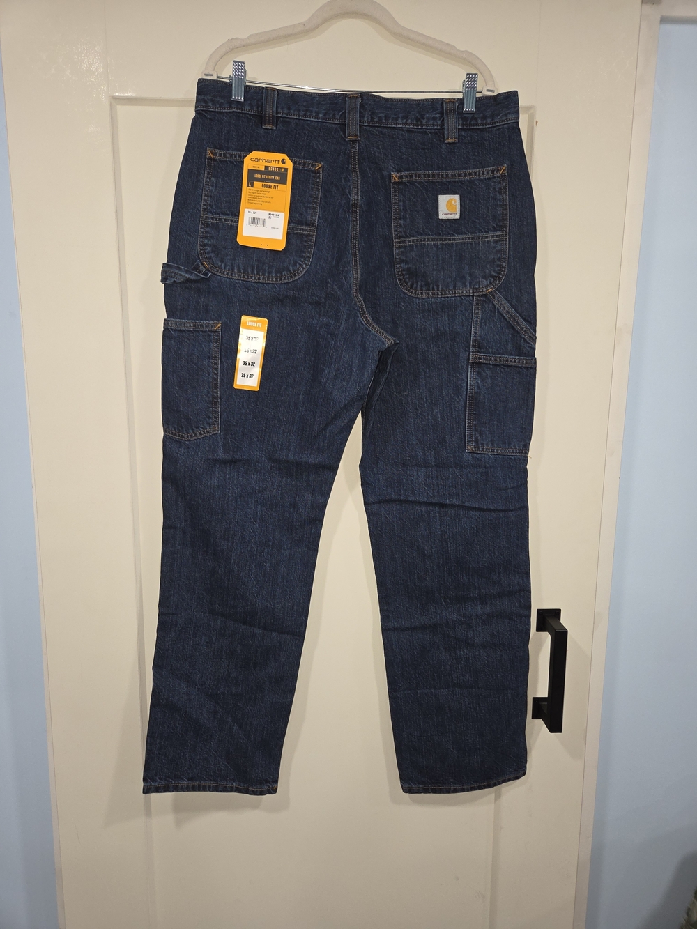 Carhartt Orange Tag on Dark Indigo Denim Loose Fit Jeans